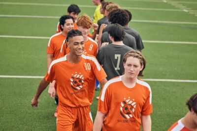 ST100_DEEP ORANGE_WHITE_Multi_Model_SMS24_1.jpg Thumbnail